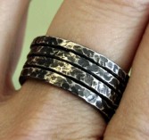 Stack of Bark Rings, worn and made by Julie A. Brown